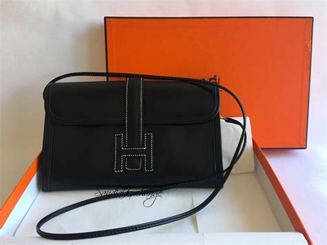 hermes clutch men|hermes jige with strap.